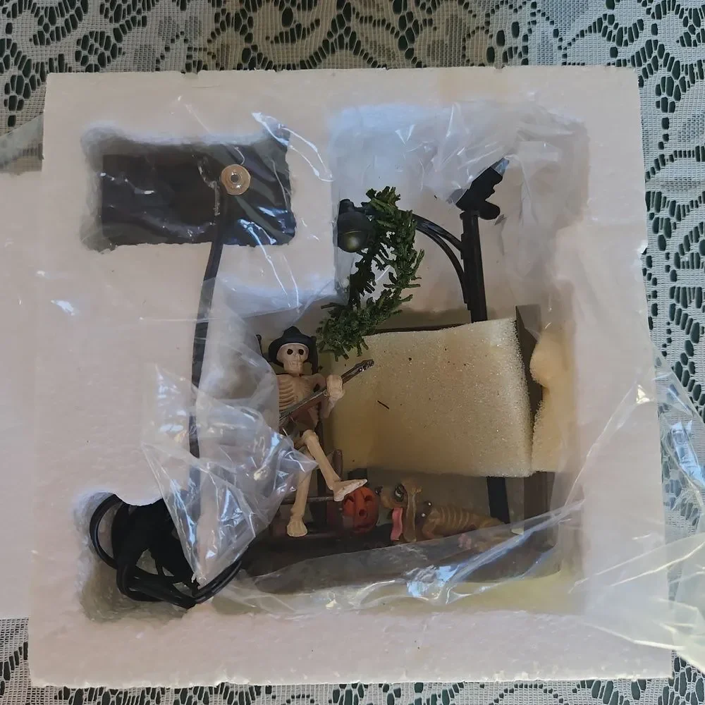 Department 56 Bone to Rock Skeleton Figurine Set